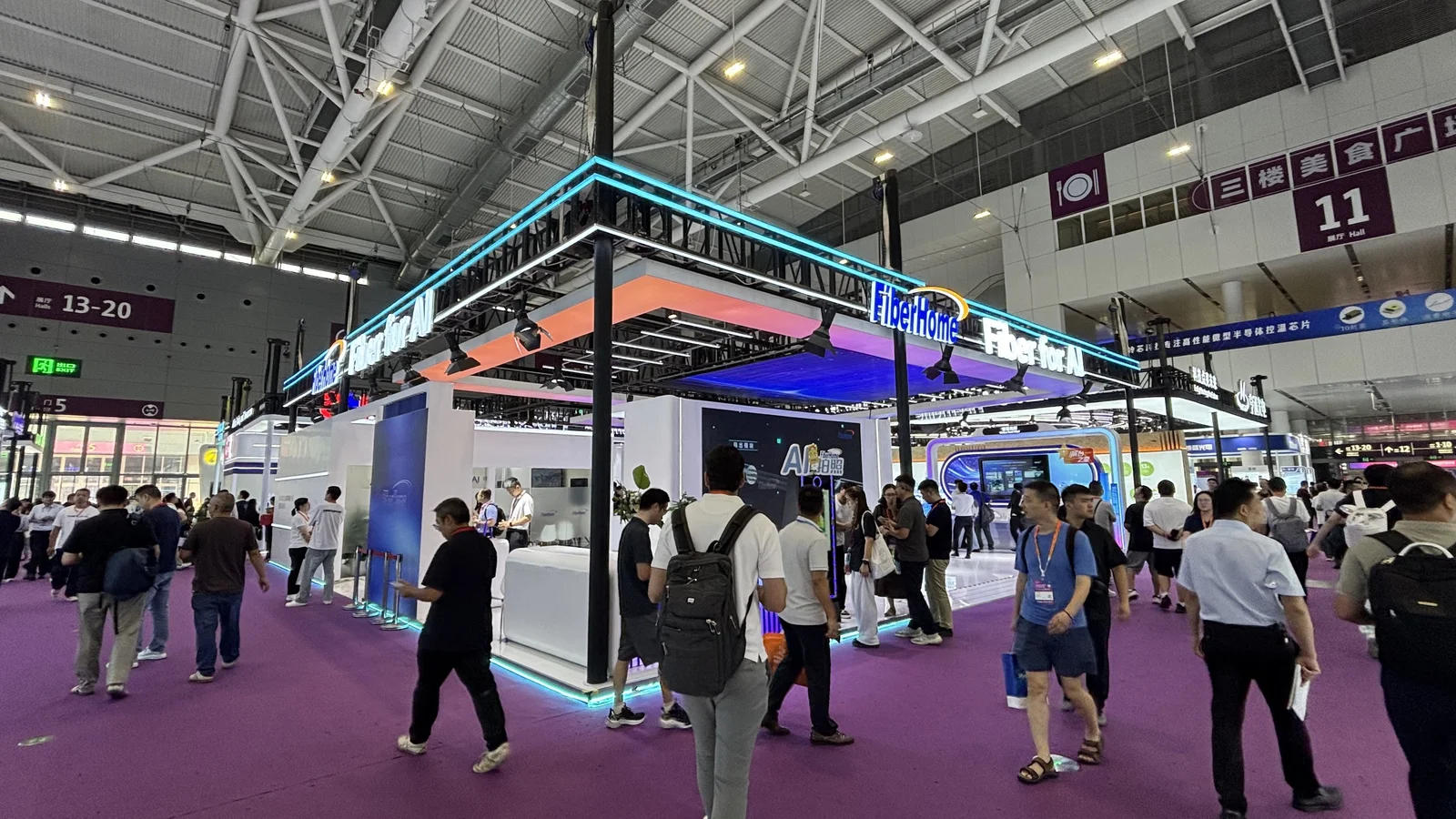 FiberHome booth at CIOE 2026 featuring Fiber for AI branding and 10G access solutions